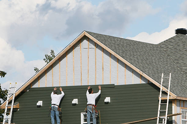Professional Siding Replacement technician working in West Harrison, IN